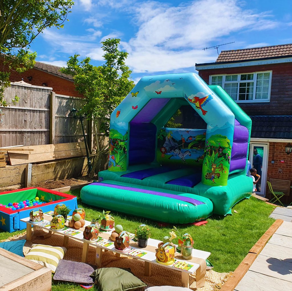 bouncy castle and table seating for kids